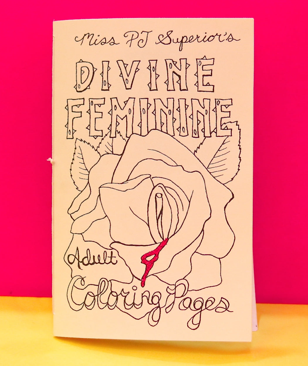Divine Feminine coloring book featuring hand drawn pictures of vaginal inspired art.